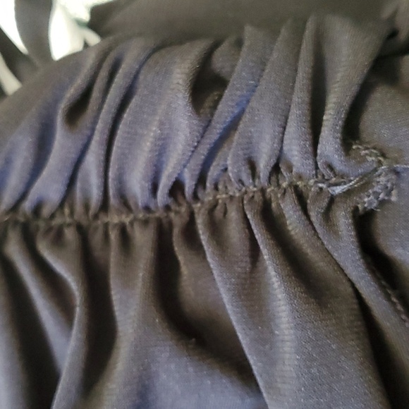 Haulter jumpsuits. Black and white striped top. Black bottom Wide leg. By Lepis - Picture 5 of 8